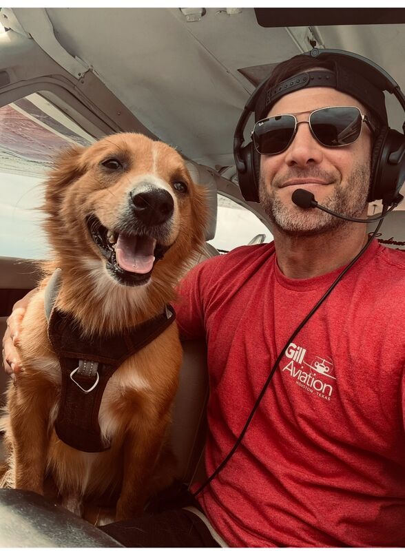 Rio safe in the cockpit with Ryan
